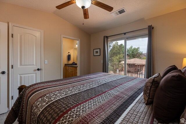 300 E 300 N Unit L5, Kanab, UT 84741 - bedroom featuring vaulted ceiling, access to outside, a ceiling fan, and ensuite bath
