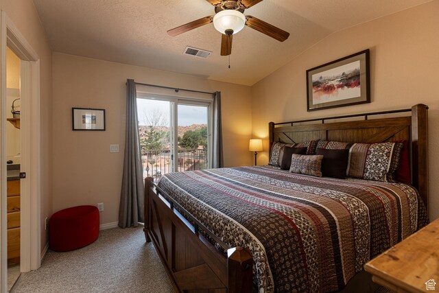 300 E 300 N Unit L5, Kanab, UT 84741 - carpeted bedroom featuring access to exterior, vaulted ceiling, a ceiling fan, and baseboards