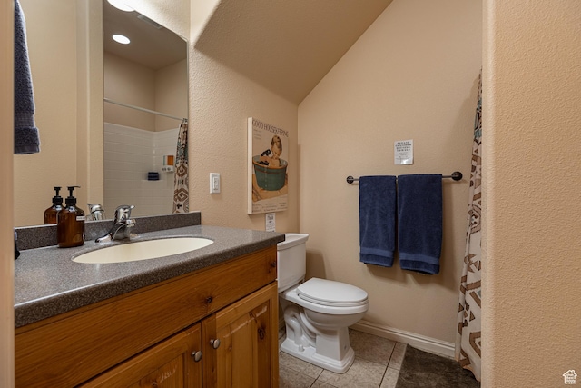 300 E 300 N Unit L5, Kanab, UT 84741 - bathroom with toilet, tile patterned flooring, vanity, a shower with shower curtain, and baseboards