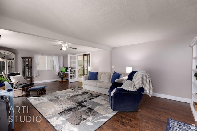 living area with french doors, baseboards, ceiling fan, and wood finished floors