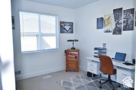 office area featuring baseboards