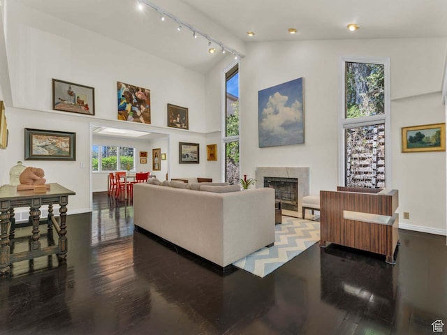 799 Northpoint Ct, Salt Lake City, UT 84103 - living room featuring high vaulted ceiling, a fireplace, and wood finished floors