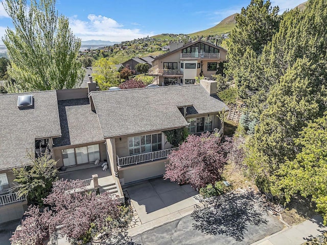 799 Northpoint Ct, Salt Lake City, UT 84103 - view of front of house featuring roof with shingles and a mountain view