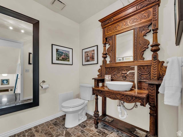 799 Northpoint Ct, Salt Lake City, UT 84103 - bathroom with baseboards and stone finish floors