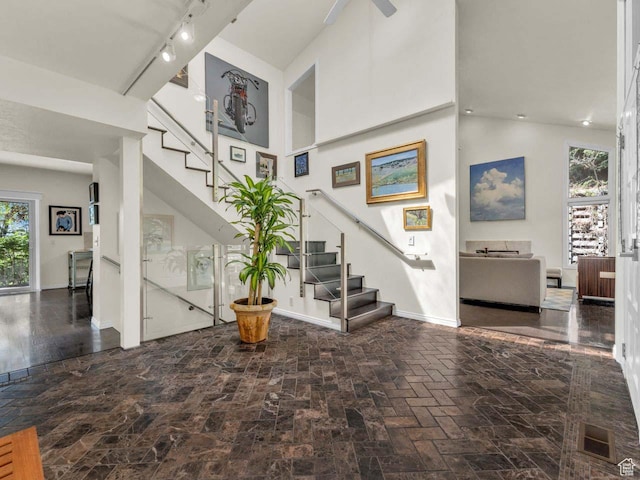 799 Northpoint Ct, Salt Lake City, UT 84103 - stairs with track lighting and a towering ceiling