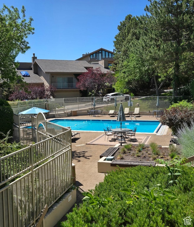 799 Northpoint Ct, Salt Lake City, UT 84103 - community pool featuring a patio area