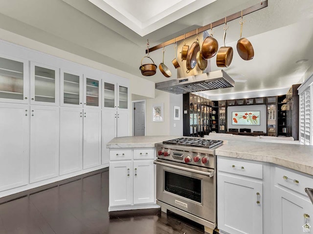 799 Northpoint Ct, Salt Lake City, UT 84103 - kitchen featuring designer range, light countertops, white cabinets, glass insert cabinets, and extractor fan