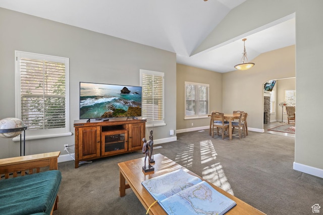 849 E Forest Farm Cir S, Salt Lake City, UT 84106 - carpeted living room with baseboards, vaulted ceiling, and arched walkways