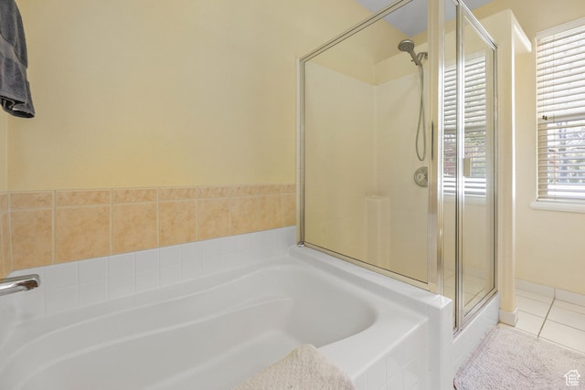849 E Forest Farm Cir S, Salt Lake City, UT 84106 - bathroom with tile patterned floors, a shower stall, and a garden tub