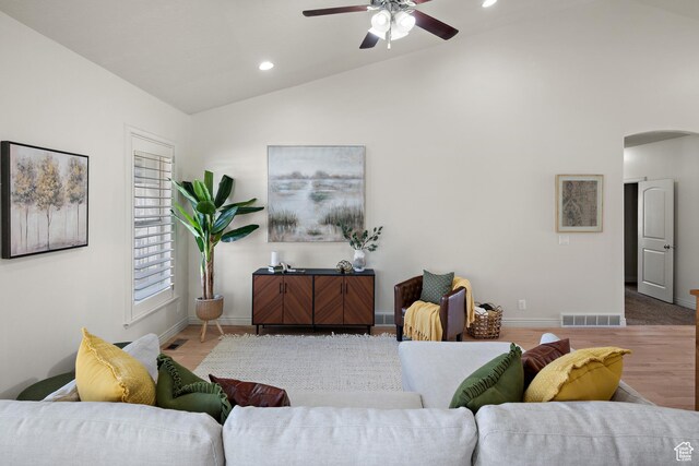 927 S Iris Ln W, Mapleton, UT 84664 - living area with a ceiling fan, arched walkways, baseboards, lofted ceiling, and recessed lighting