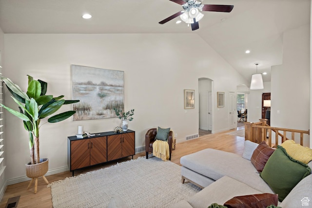 927 S Iris Ln W, Mapleton, UT 84664 - living room with visible vents, ceiling fan, recessed lighting, light wood-type flooring, and arched walkways