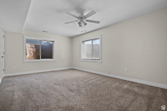 927 S Iris Ln W, Mapleton, UT 84664 - carpeted spare room with ceiling fan, visible vents, and baseboards