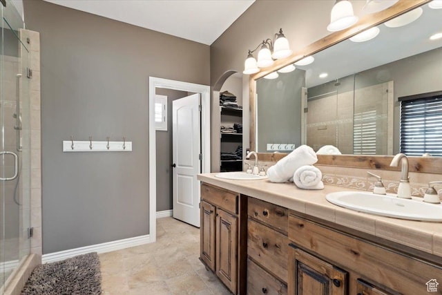 2077 E Genova Dr S, Draper, UT 84020 - full bathroom with a sink, a stall shower, and a spacious closet