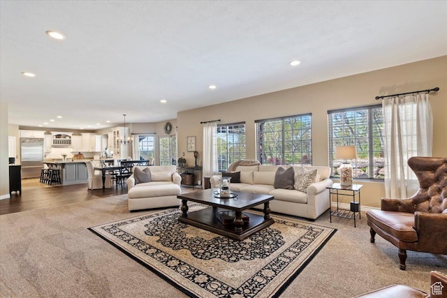 2077 E Genova Dr S, Draper, UT 84020 - living area with recessed lighting, baseboards, and light colored carpet