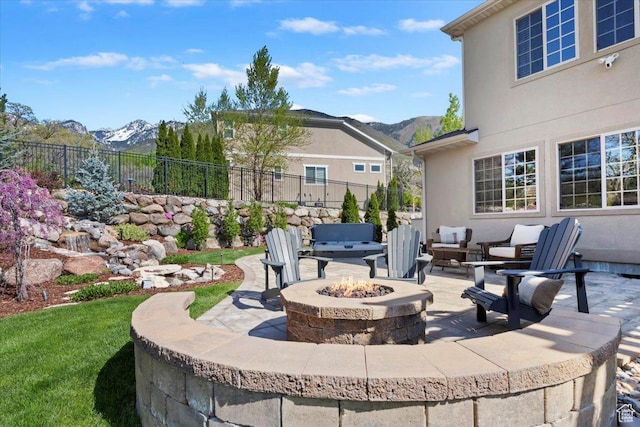 2077 E Genova Dr S, Draper, UT 84020 - view of patio with a fire pit, a mountain view, and fence