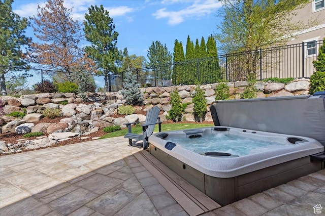 2077 E Genova Dr S, Draper, UT 84020 - view of patio / terrace with fence and a covered hot tub