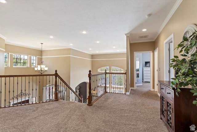 2077 E Genova Dr S, Draper, UT 84020 - hallway with visible vents, crown molding, a notable chandelier, carpet floors, and an upstairs landing