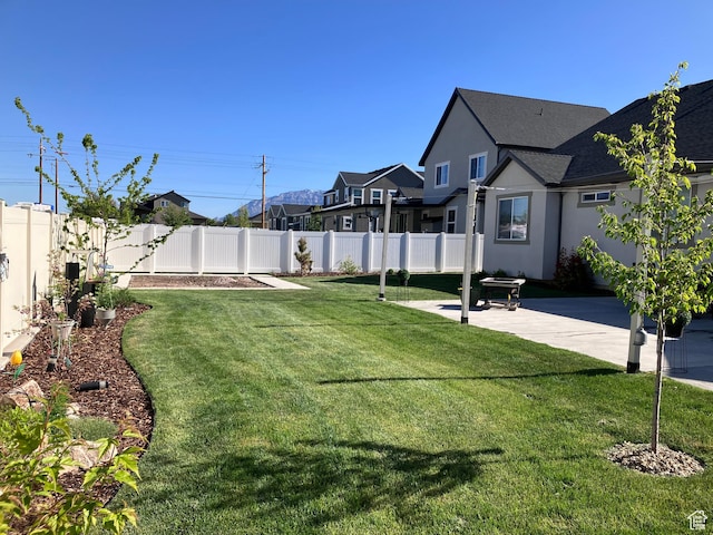 1831 S 2525 W Unit 103, West Haven, UT 84401 - view of yard featuring a patio and a residential view