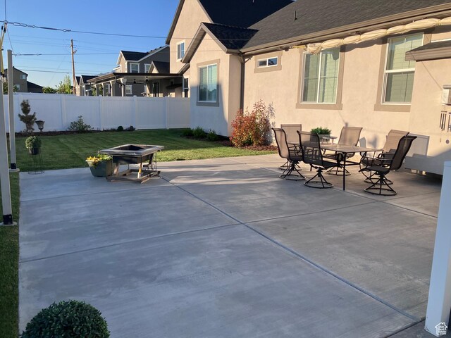 1831 S 2525 W Unit 103, West Haven, UT 84401 - view of patio / terrace featuring a fire pit and outdoor dining area