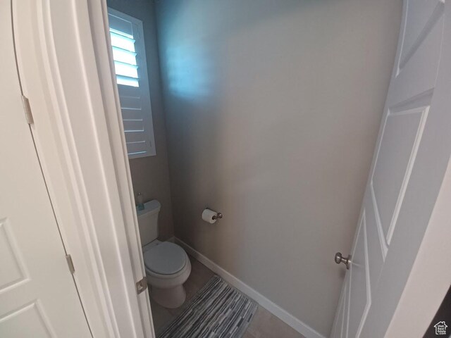 1831 S 2525 W Unit 103, West Haven, UT 84401 - bathroom featuring toilet and baseboards