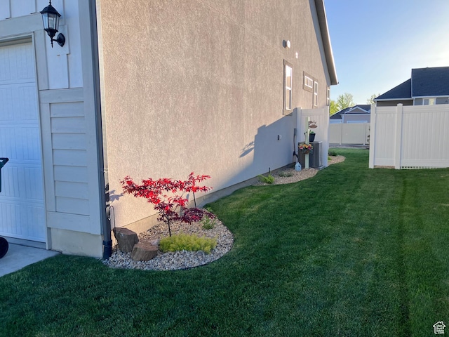 1831 S 2525 W Unit 103, West Haven, UT 84401 - view of home's exterior featuring central AC unit and stucco siding