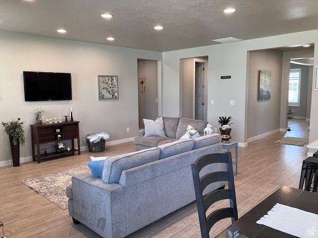 1831 S 2525 W Unit 103, West Haven, UT 84401 - living room with recessed lighting and light wood-type flooring