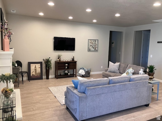 1831 S 2525 W Unit 103, West Haven, UT 84401 - living room featuring recessed lighting, baseboards, and light wood-type flooring