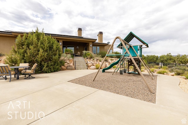 415 W Silver Hills Rd, Leeds, UT 84746 - community play area with a patio and fence