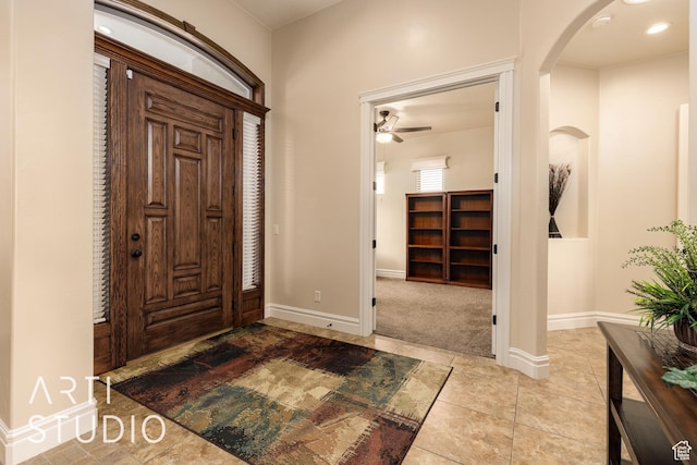 415 W Silver Hills Rd, Leeds, UT 84746 - foyer with arched walkways, baseboards, tile patterned floors, and ceiling fan