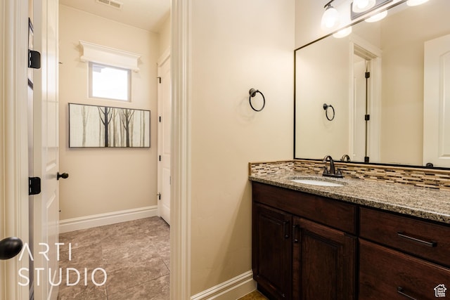 415 W Silver Hills Rd, Leeds, UT 84746 - bathroom with baseboards, vanity, and visible vents