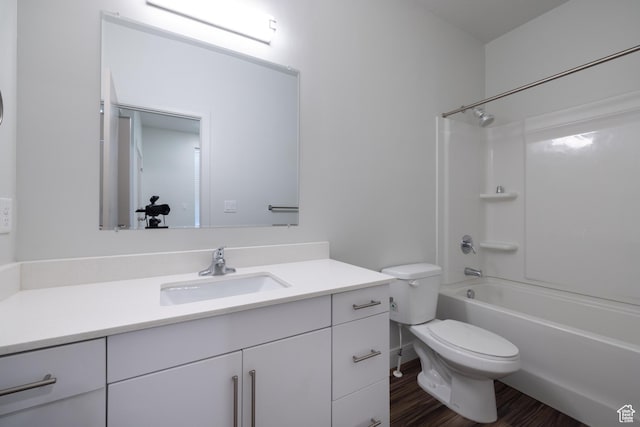 1602 E 3300 S, Millcreek, UT 84106 - bathroom featuring vanity, bathing tub / shower combination, toilet, and wood finished floors