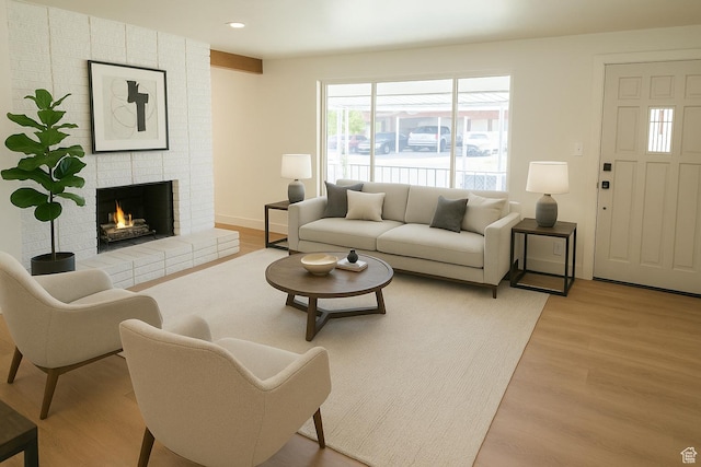 8193 S 1330 E, Sandy, UT 84093 - living area with a brick fireplace, light wood-type flooring, and recessed lighting