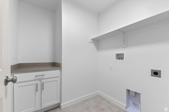 laundry area featuring cabinet space, electric dryer hookup, baseboards, and hookup for a washing machine