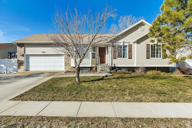 5943 N Genoa Ln W, Stansbury Park, UT 84074 - single story home with a garage, driveway, and a front yard