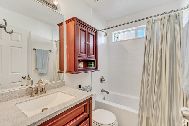 5943 N Genoa Ln W, Stansbury Park, UT 84074 - bathroom with vanity, toilet, and shower / tub combo
