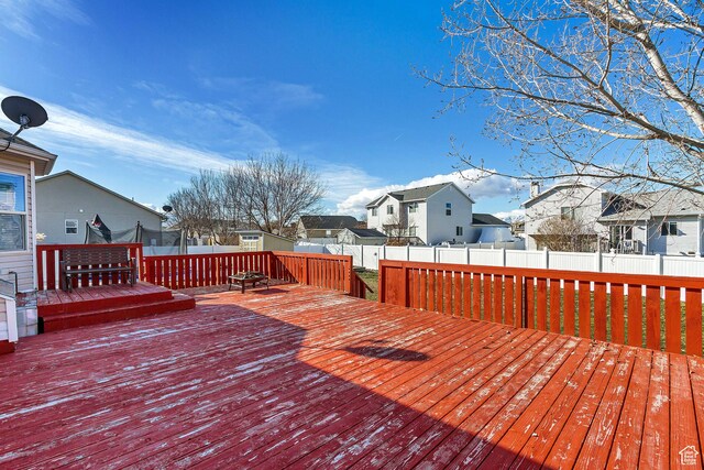 5943 N Genoa Ln W, Stansbury Park, UT 84074 - deck featuring a residential view and a fenced backyard