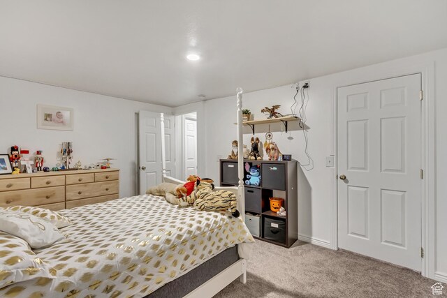5943 N Genoa Ln W, Stansbury Park, UT 84074 - carpeted bedroom featuring baseboards