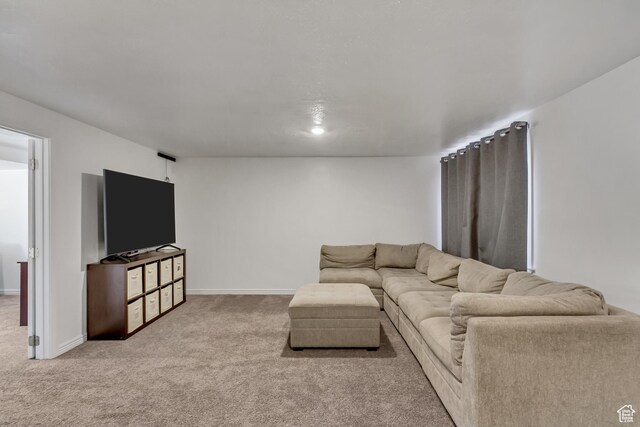 5943 N Genoa Ln W, Stansbury Park, UT 84074 - carpeted living area with baseboards