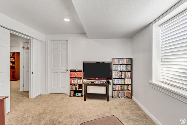 5943 N Genoa Ln W, Stansbury Park, UT 84074 - sitting room with baseboards, carpet flooring, and recessed lighting