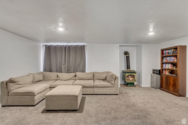 5943 N Genoa Ln W, Stansbury Park, UT 84074 - living area with recessed lighting, a wood stove, carpet, and baseboards