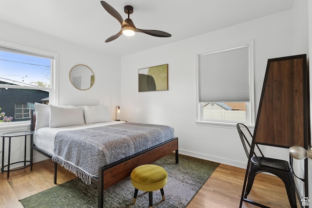740 E Barrows Ave, Salt Lake City, UT 84106 - bedroom with wood finished floors, baseboards, and ceiling fan