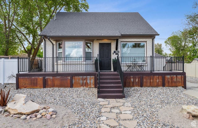 740 E Barrows Ave, Salt Lake City, UT 84106 - view of front of house with a porch and fence