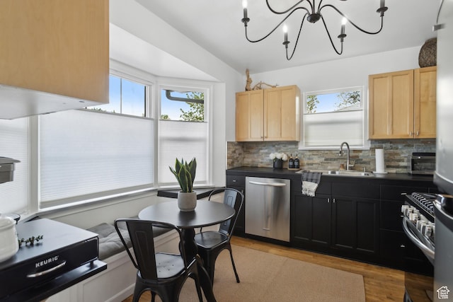 740 E Barrows Ave, Salt Lake City, UT 84106 - kitchen with stainless steel appliances, plenty of natural light, light wood finished floors, and light brown cabinets