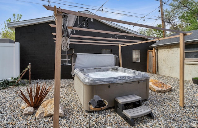 740 E Barrows Ave, Salt Lake City, UT 84106 - view of home's exterior featuring a hot tub, concrete block siding, and fence