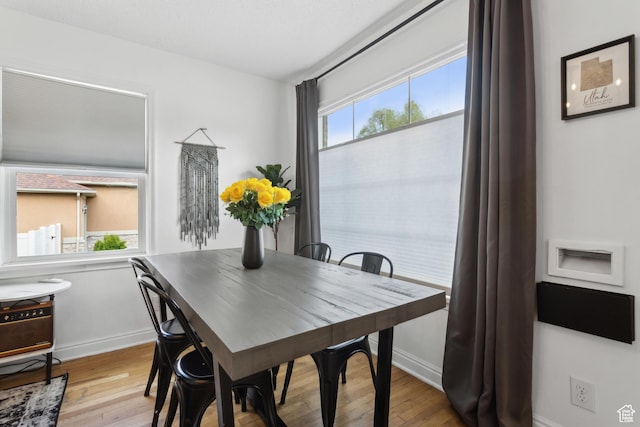 740 E Barrows Ave, Salt Lake City, UT 84106 - dining space with baseboards and hardwood / wood-style floors