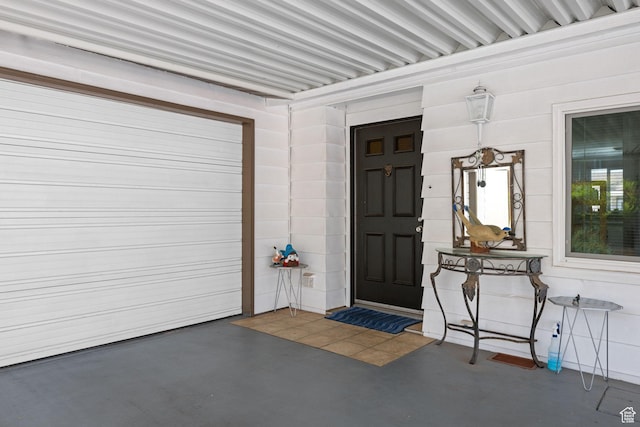 1526 N Dixie Downs Dr Unit 53, St George, UT 84770 - doorway to property featuring a garage and a porch