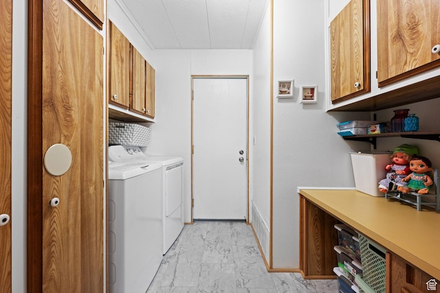 1526 N Dixie Downs Dr Unit 53, St George, UT 84770 - clothes washing area with cabinet space, a textured ceiling, washer and clothes dryer, and marble finish floor