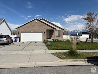 6267 S Waller Ln W, West Jordan, UT 84081 - ranch-style home with a garage and driveway