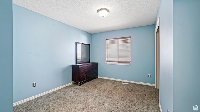6267 S Waller Ln W, West Jordan, UT 84081 - unfurnished bedroom with a textured ceiling, carpet flooring, and baseboards
