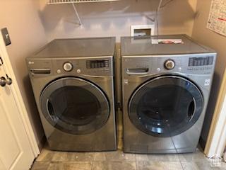 6267 S Waller Ln W, West Jordan, UT 84081 - clothes washing area with washing machine and clothes dryer and laundry area